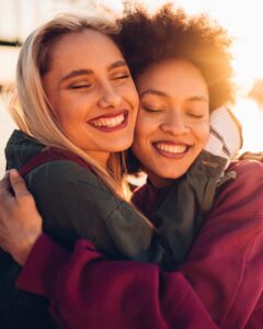 Two women hugging