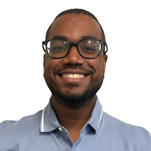 A smiling photo of Troy O'Neill, with glasses, wearing a light blue polo shirt, looks directly at the camera against a white background, conveying a friendly tone.