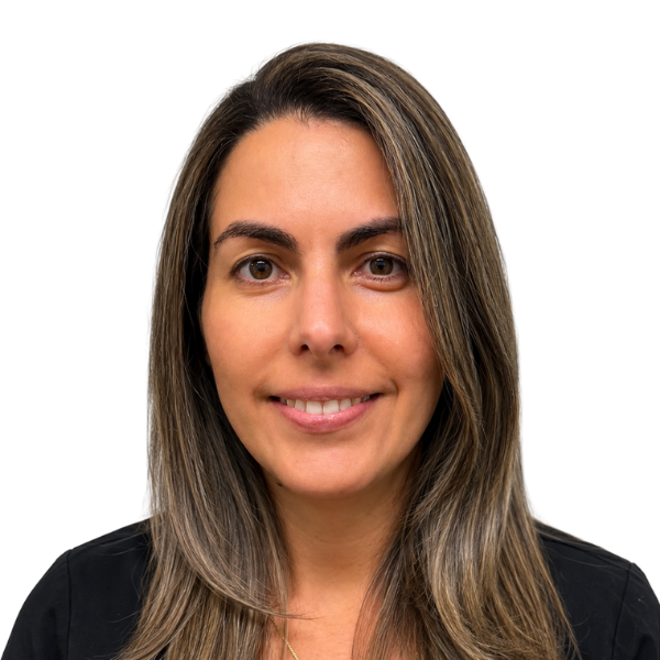 Head-and-shoulders portrait of Yosnarys Ramirez, a smiling woman with long brown hair and subtle highlights, wearing black, against a plain white background.